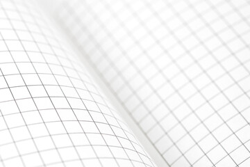Empty blank sheet of maths paper on working table. Close up. Selective focus.