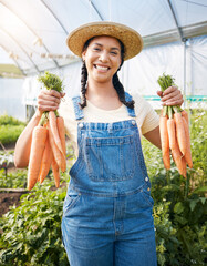 Farming, portrait of woman with carrots and smile at sustainable small business, agriculture and...