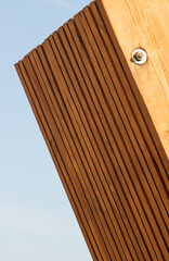 wooden board against the blue sky.