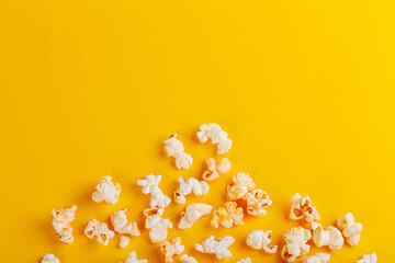 box with popcorn on a yellow background