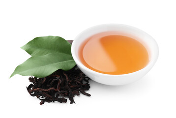 Traditional Chinese pu-erh tea, freshly brewed beverage and green leaves isolated on white