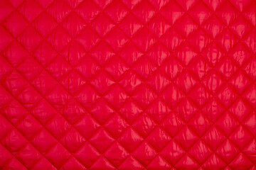 Fabric velour quilted close-up. Quilted surface upholstery