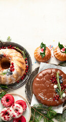 Variety of Christmas holiday desserts and sweets. Christmas decoration.