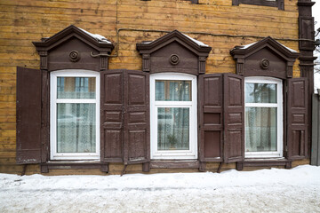 Facade of typical Russian log house, located in the historical center of Irkutsk