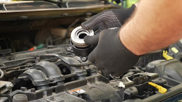 A new spare part with an injection bearing assembly for car repair. Car repair and maintenance.