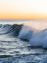 Beautiful breaking wave in the morning.