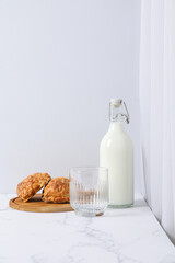Breakfast tasty food concept - milk with bakery products