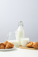 Breakfast tasty food concept - milk with bakery products
