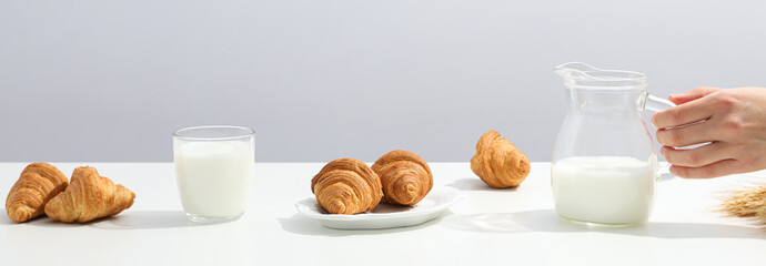 Breakfast tasty food concept - milk with bakery products