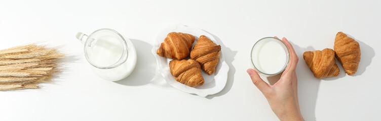 Breakfast tasty food concept - milk with bakery products