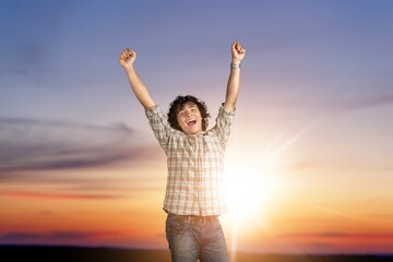 Man feeling happy and free in nature background