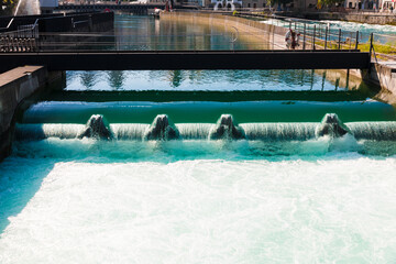 Great close-up view of the renovated hydroelectric power plant Mühlenplatz in Lucerne, equipped...