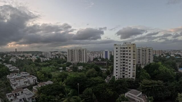 Beautiful Evening timelapse of Pune city with clear blue skies at sunset with urban cityscape