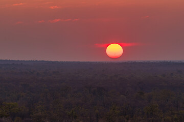 A Fiery African Sunset With Visible Sunspots