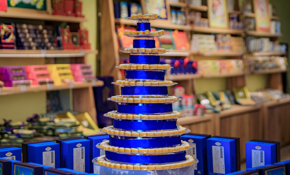 Traditional white glazed French calissons almonds cookies with icing from Provence on a display at a candy shop, Saint Paul de Vence, South of France