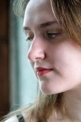 Portrait of a young pretty attractive brown-haired girl