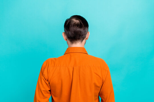 Back view photo cadre behind head businessman elderly lotion hair shampoo wear stylish orange shirt isolated on aquamarine color background