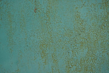 Metal rusty surface with shabby background paint. Texture blue cracked paint on an iron sheet. Fragment of an old metal gate, Metal Corrosion