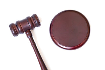 judge's gavel on a stand on a white background. justice concept. isolated object.