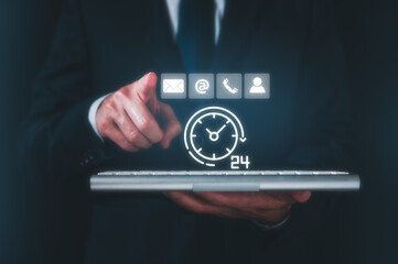 Businessman using wireless computer keyboard searching web, browsing information, working at home. concept Contact us 24 hours or Customer support hotline people connect, customer services