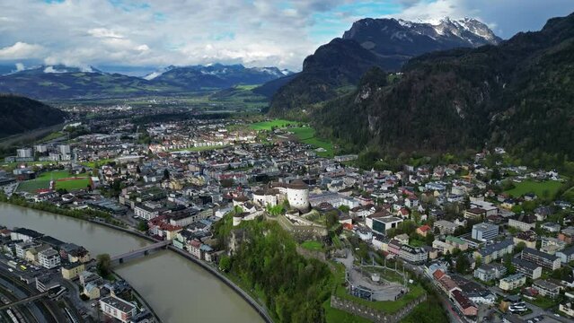 Aerial around view of Kufstein town with medieval Castle fortress in Tyrol, Austria, Alps mountains, 4k