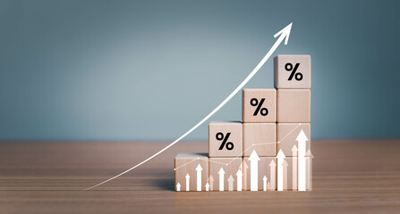 Interest rate financial and mortgage rates concept. Wooden blocks with Icon percentage symbol and...