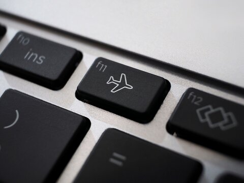 Black Burton airplane mode or  flight mode on a keyboard
