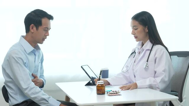 4k slow motion of asian female doctor specialist and male patient discussing Flu (influenza) is infection of nose, throat, lungs, respiratory system. head, body aches, sore throat, fever, respiratory