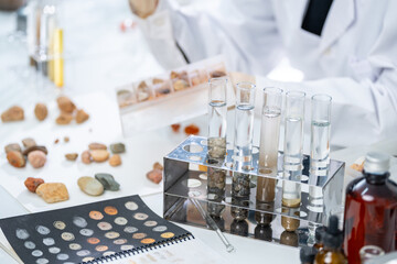 Rock sample in geology science laboratory research, mineral soil test in chemistry lab industry...