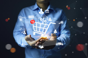 Seller or merchant is holding shopping cart to sales through online store marketplaces promotion discount percentages to attract customers to boost sales as a marketing strategy. - obrazy, fototapety, plakaty