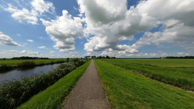 River Eem and polder bicycle path near Eemdijk in the Netherlands