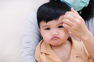 A happy baby boy, full of innocence and joy, captured in a closeup portrait, radiating warmth...