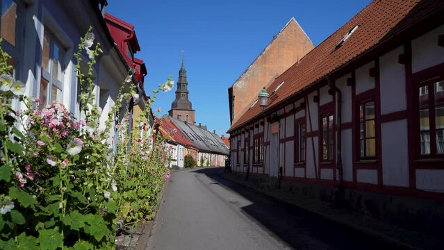 Cobblestone Street in Old Town with Housing in Ystad Midtown overlooking Church and City Center, Skane Sweden.