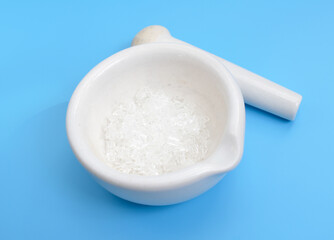Sodium thiosulfate or sodium thiosulphate on blue background