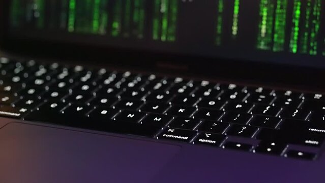Encrypted fast-scrolling programming security hacking code. Encrypted message on Computer Screen. Laptop screen with coding