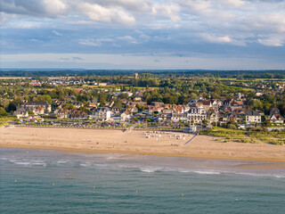 Aerial view of the coastline and beach in Caen, France.