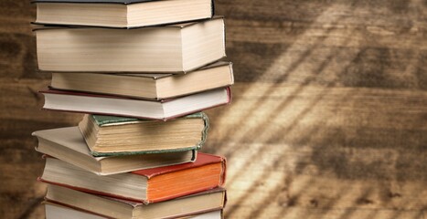 Old books for reading on wooden desk