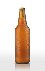brown glass bottle with beer in drops