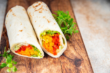 tortilla wrap vegetable tacos vegetarian food burrito veganfajita shawarma vegetables pita healthy meal food snack on the table copy space food background rustic top view 