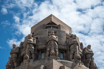 monument to the battle of the nations in Leipzig, Saxony, Germany at daytime against cloudy sky,...