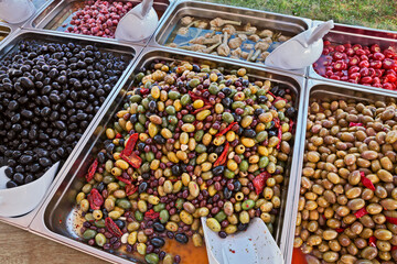 gourmet assortment of pickled olives in italian market