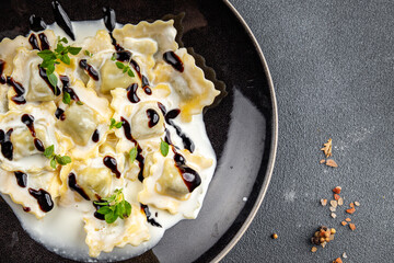 ravioli seafood cream sauce pasta meal food snack on the table copy space food background rustic top view