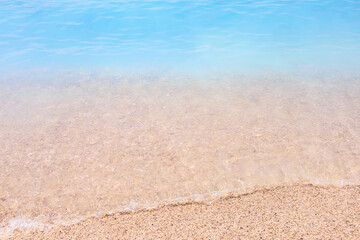 Seashore of small white pebbles on the beach in Oludeniz, blue lagoon. The cleanest beach with blue flag. Background