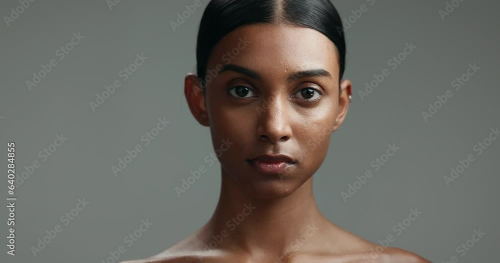 Poster Serious face of Indian woman on gray background for skincare, beauty and wellness in studio. Dermatology, salon and portrait of person for natural cosmetics, makeup and healthy skin for spa care