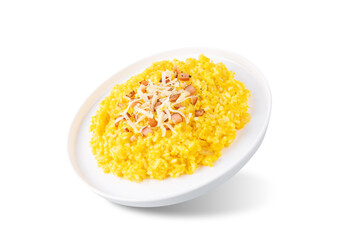 Pumpkin risotto with fried bacon on a white isolated background