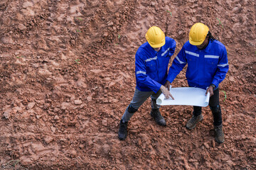 top aerial view engineer worker builders looking drawing for construction. Concept smart people...