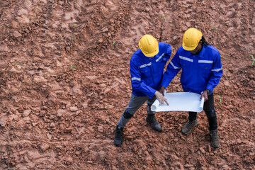 top aerial view engineer worker builders looking drawing for construction. Concept smart people...