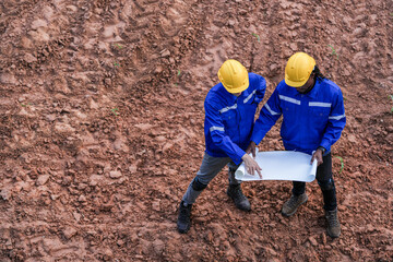 top aerial view engineer worker builders looking drawing for construction. Concept smart people...