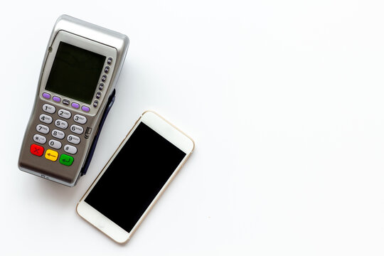 POS payment terminal reader with mobile phone. Online banking concept