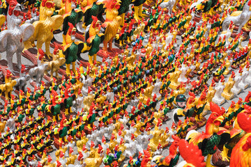Fototapeta na wymiar Chickens statue are worship and placed at the temple